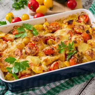 Vegetarian Vegetable casserole with zucchini, mushrooms and cherry tomatoes