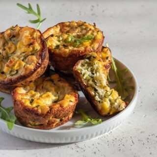 corn zucchini egg muffins on a table